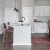 a kitchen with white cabinets